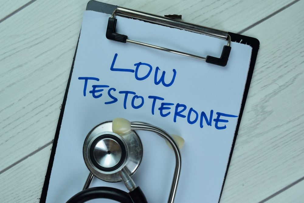 A male patient discussing low testosterone symptoms with his doctor