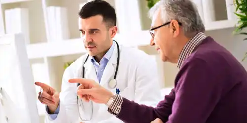 A doctor and his patient discussing treatment