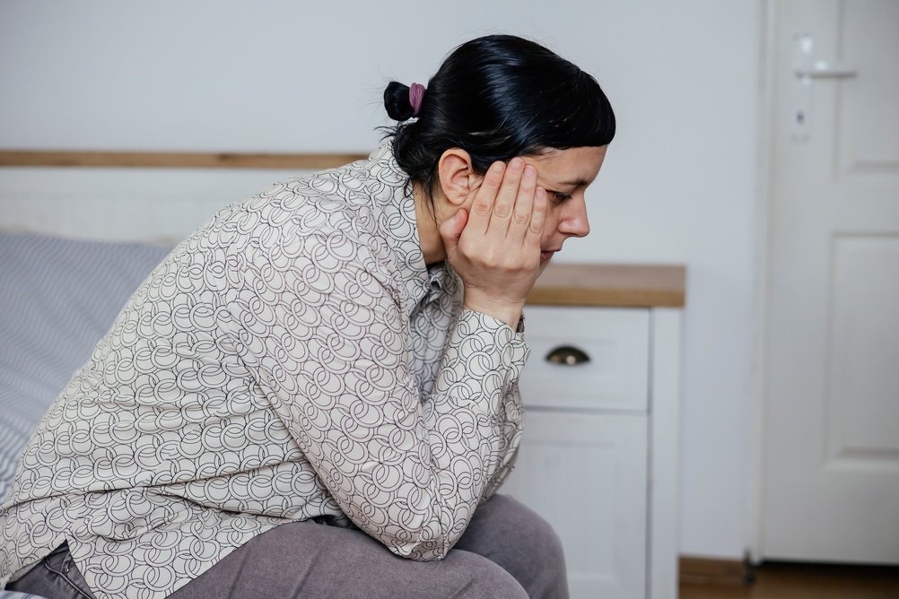 A woman talking with her gynecologist about perimenopause symptoms