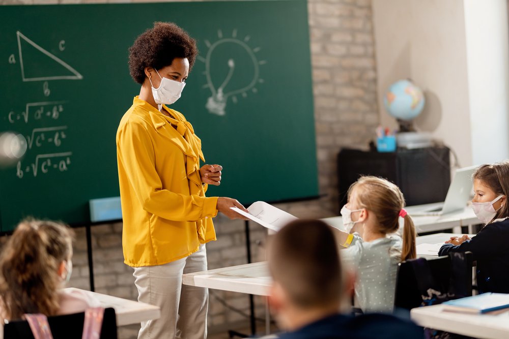 teacher teaching to the student