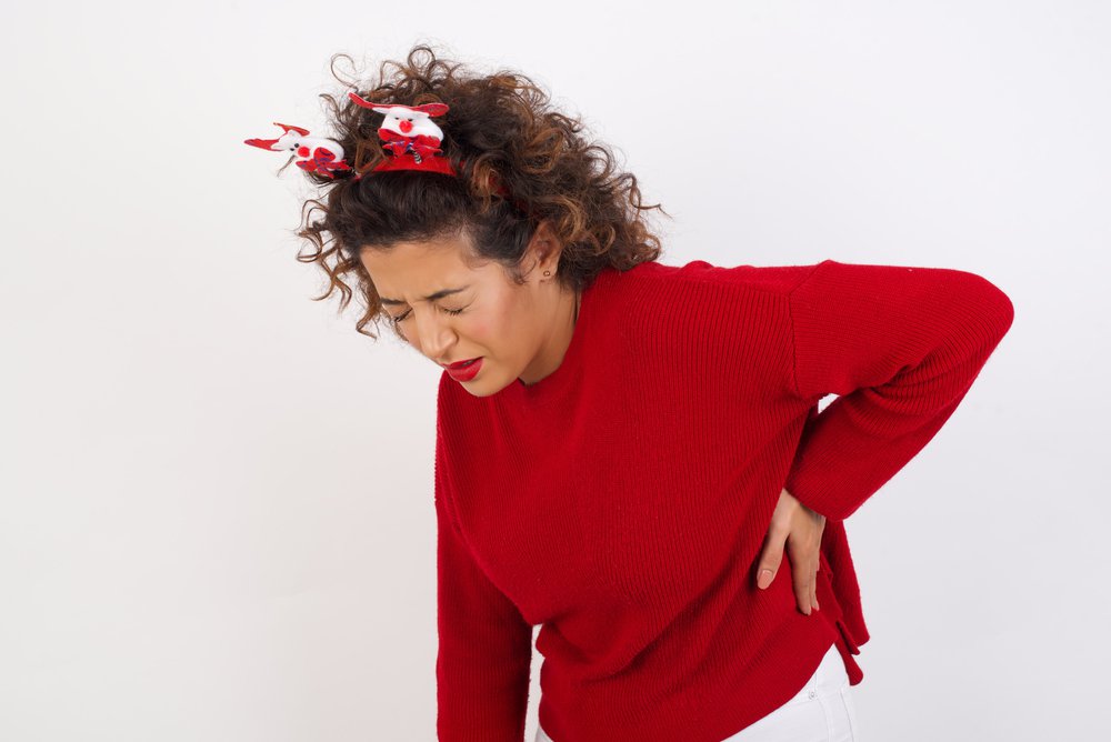 Young lady having back pain