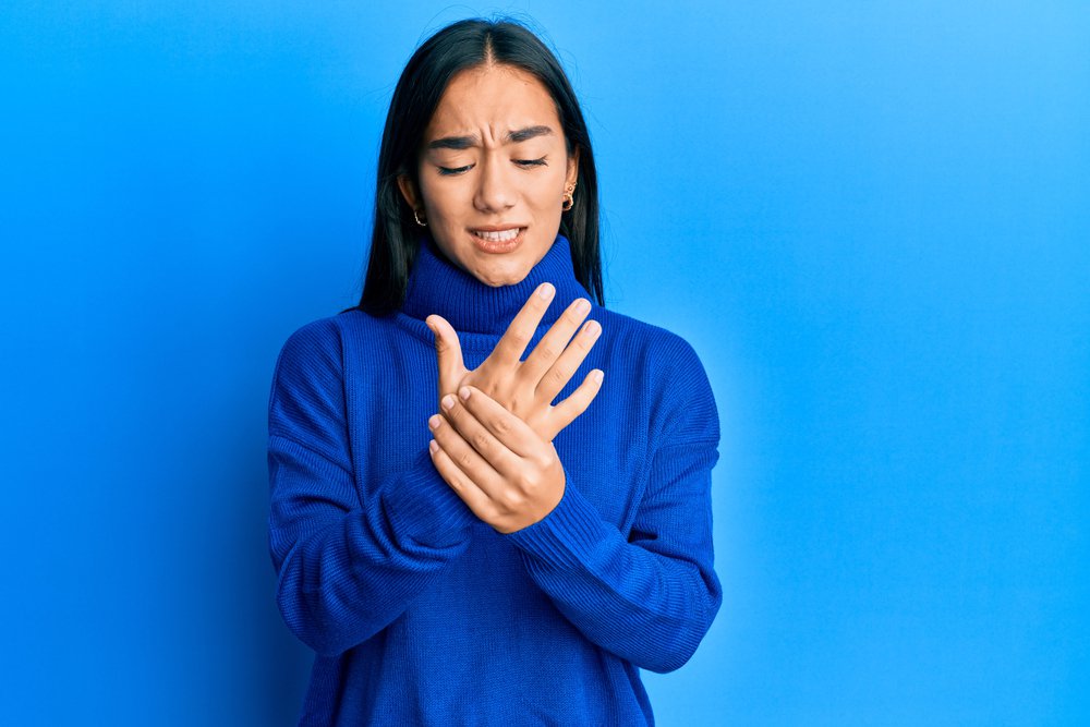 Young lady having back pain