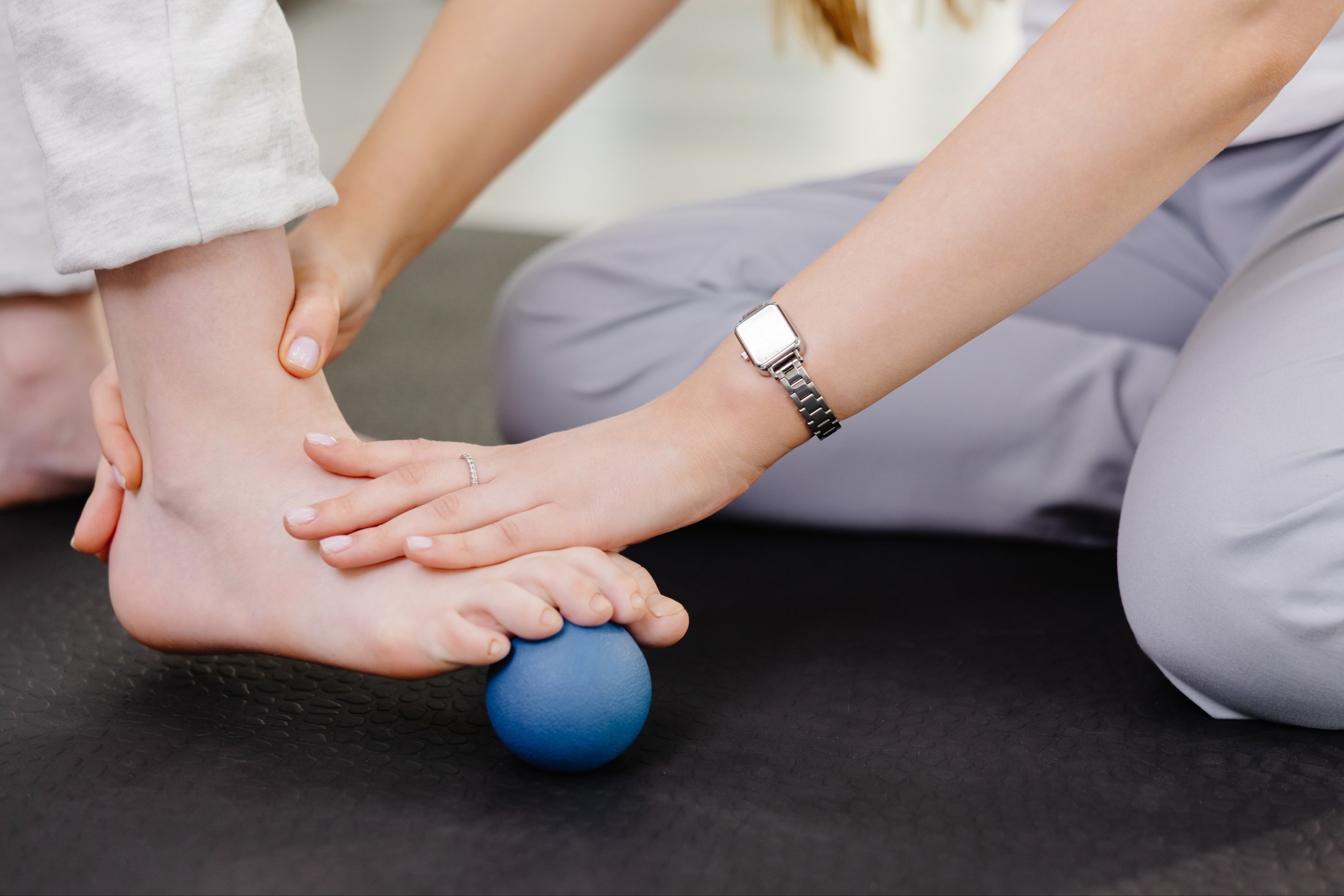 Physiotherapist guiding patient through rehabilitation exercises