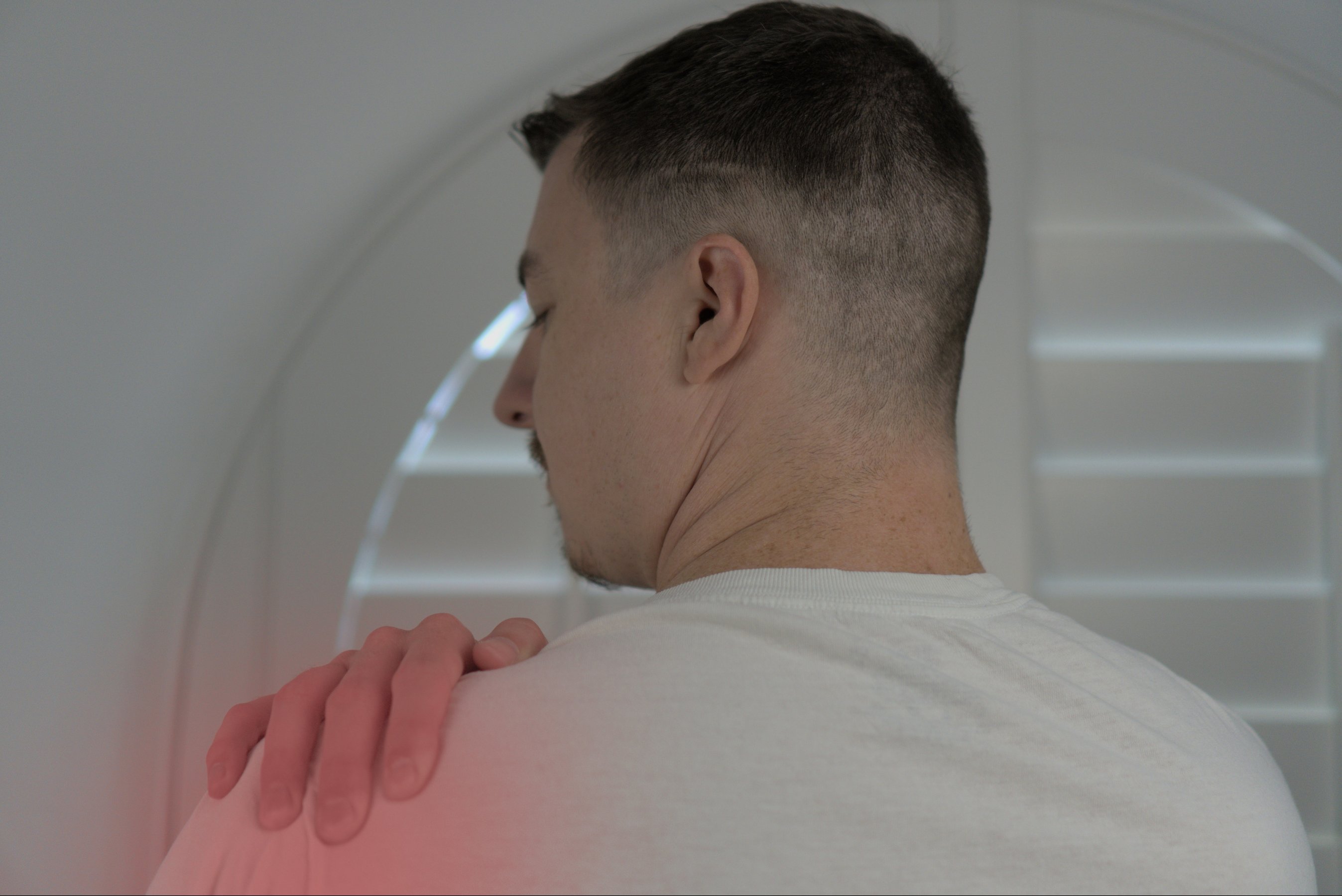 man has pain in his shoulder