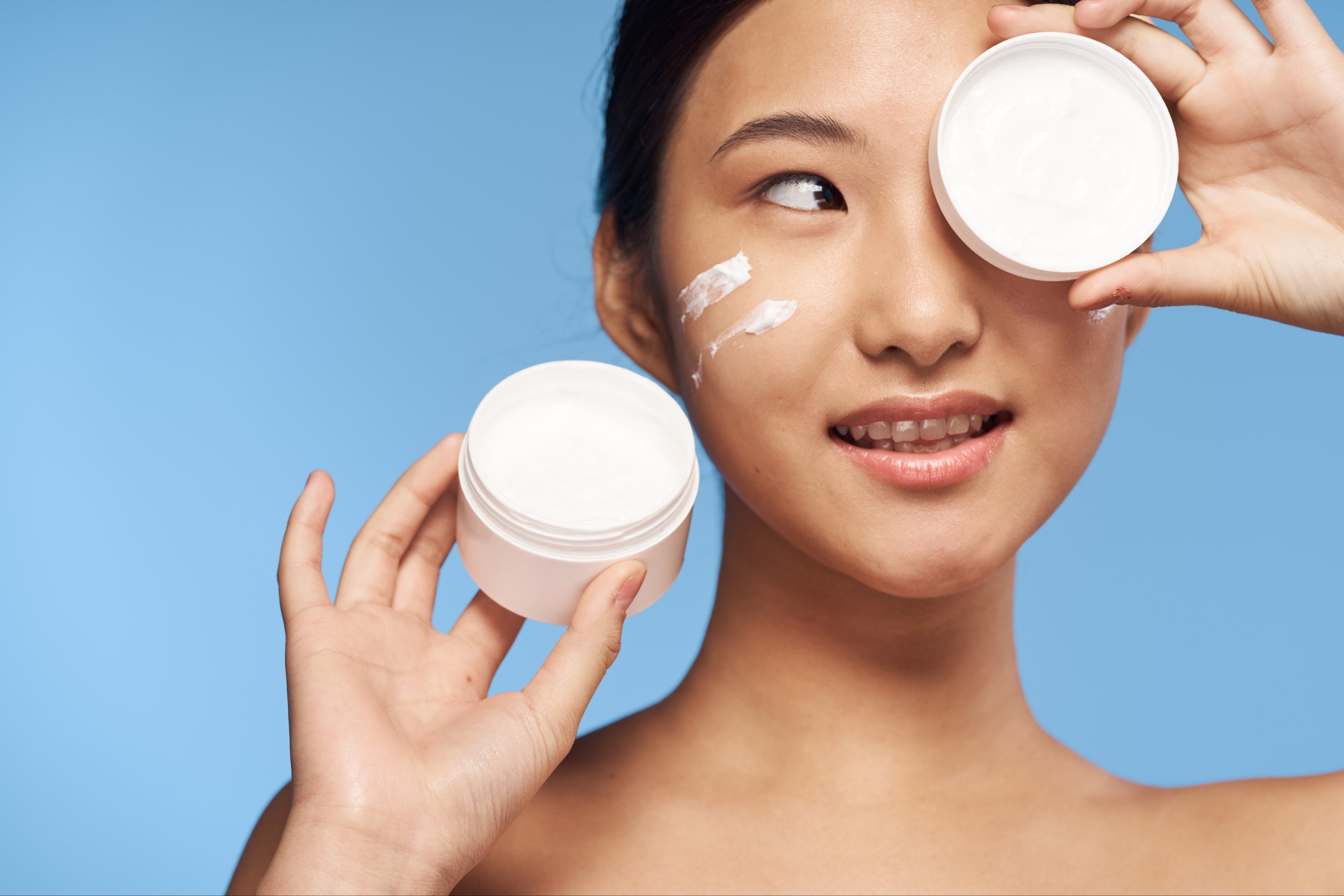 woman naked shoulders clean skin cream care dermatology