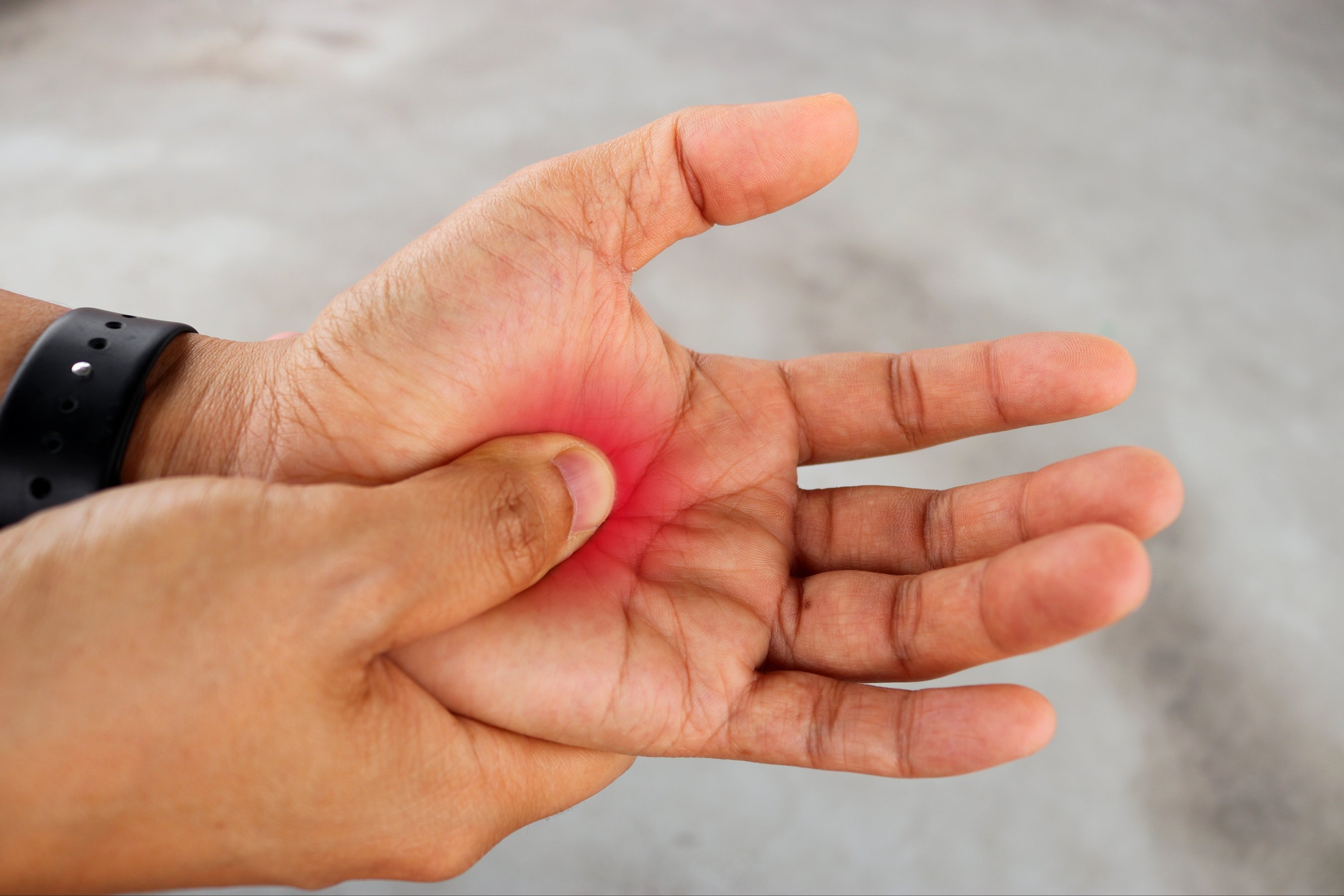 man hand press down with your thumb to palm of feet