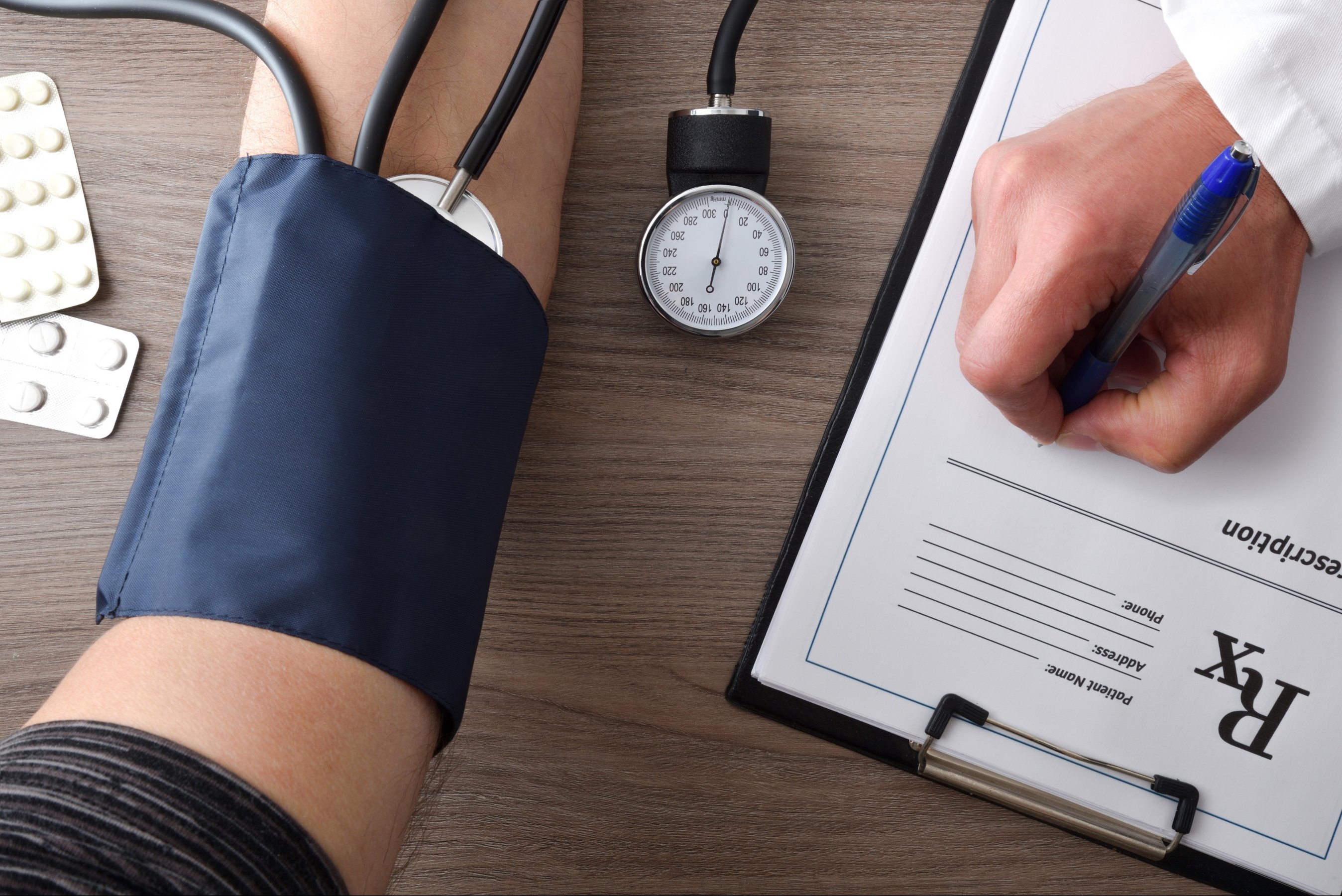 Checking a patient heart health and blood pressure