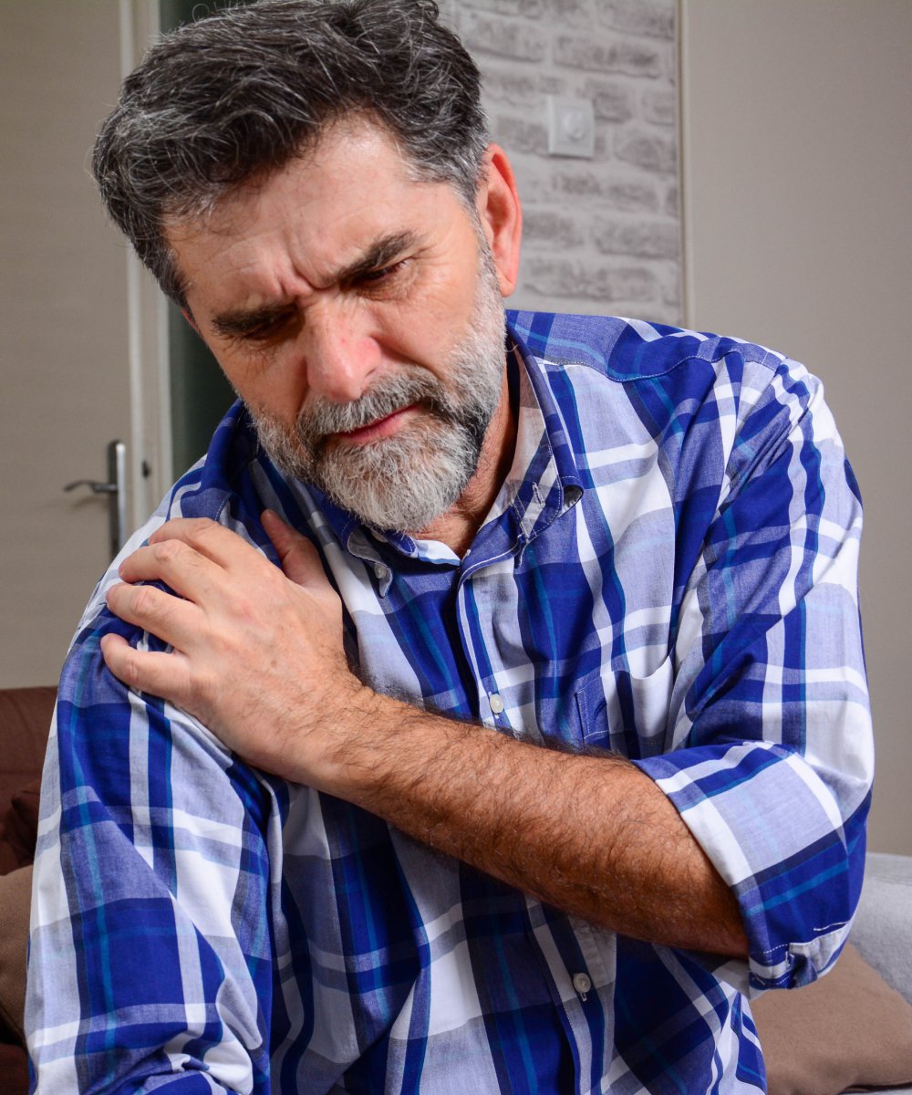 Man Suffering from Pain in Shoulder