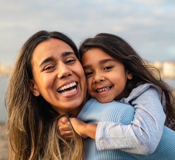 A happy single parent after taking Surrogacy sevices for Singles in colombia
