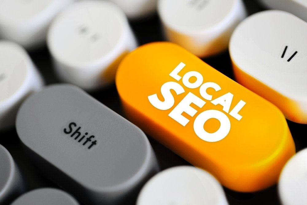 Close-up of a computer keyboard with a bright yellow key labeled “Local SEO,” symbolizing why local SEO was critical in helping an orthopedic practice gain online visibility and attract patients.