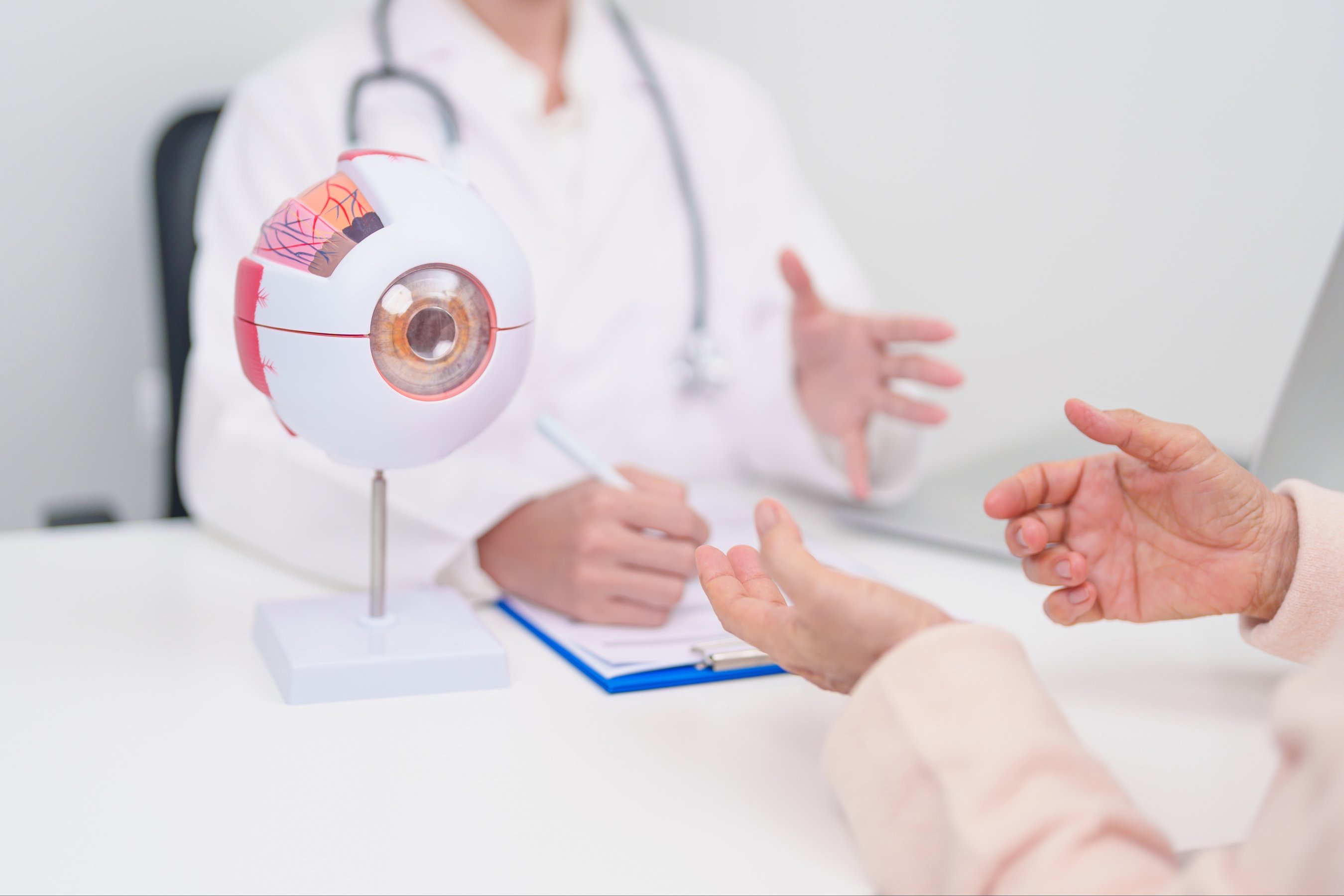 Elderly Patient consulting Doctor to Eye disease