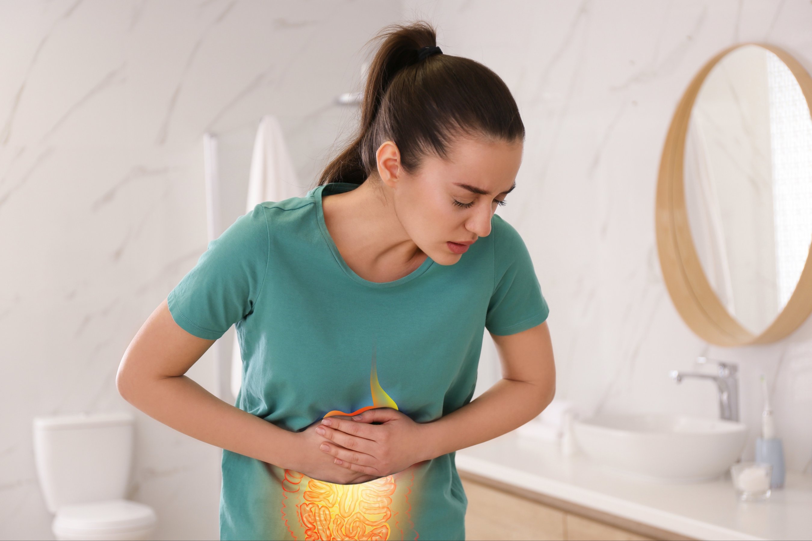 Woman suffering from abdominal pain