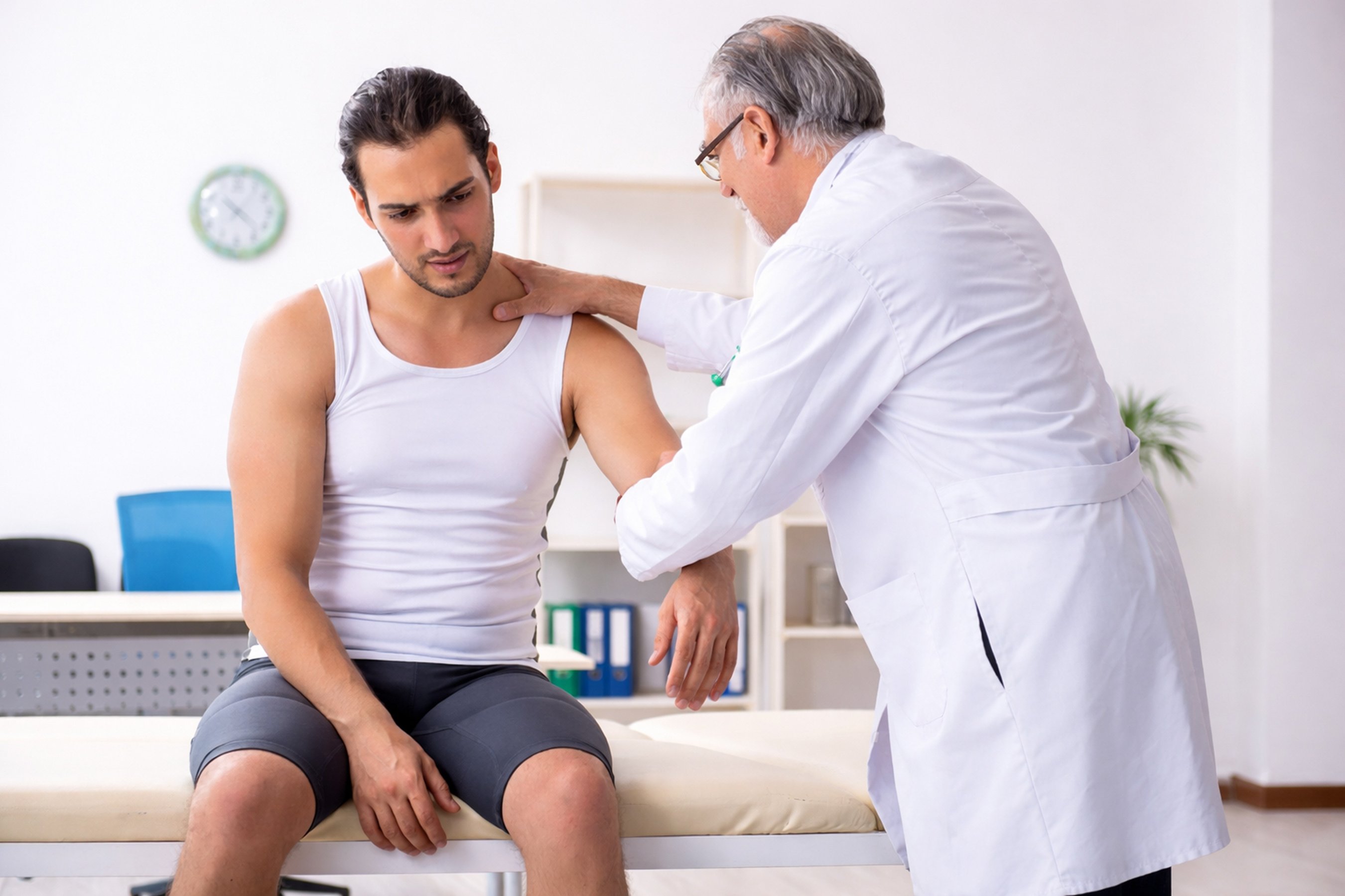 male patient visiting experienced doctor