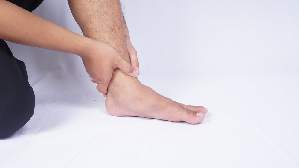 A clinician examining a patient
