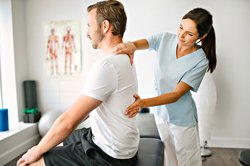 Chiropractic Adjustment Does the Trick for an Aching Mid-Back 