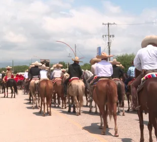 Charros en caballos