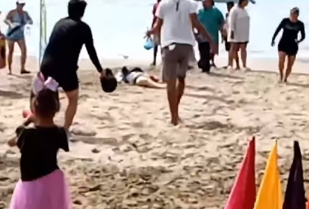 Mujer atacada por tiburon