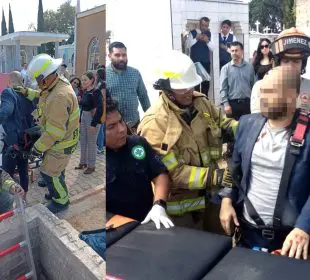Hombre siendo rescatado de una tumba