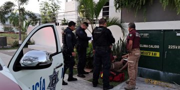 Agentes de seguridad y PC atendiendo lesionado