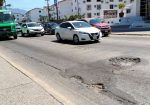 Bache en el crucero de El Pitillal