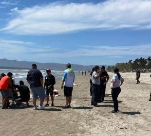 Personas en playa