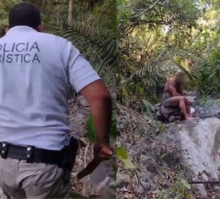 Policías rescatando a extranjero en cerro