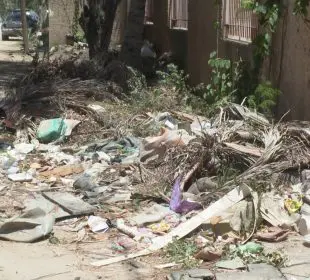Basura acumulada en calle Invierno