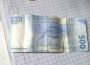 Billete falso en una libreta