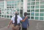 Menor Joaquín llegando a la Fiscalía