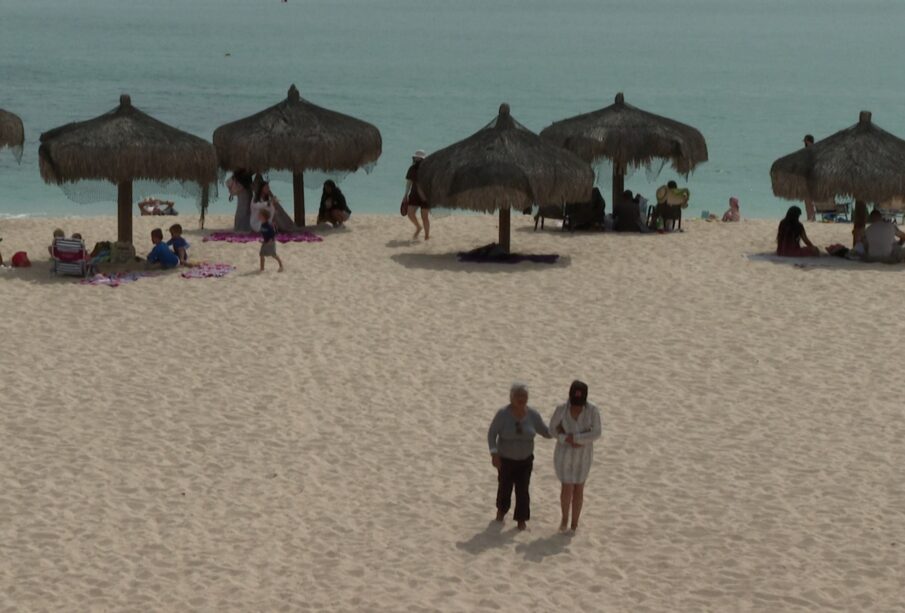 personas en la playa