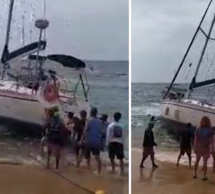 Velero varado en playa El Médano en Cabo San Lucas.