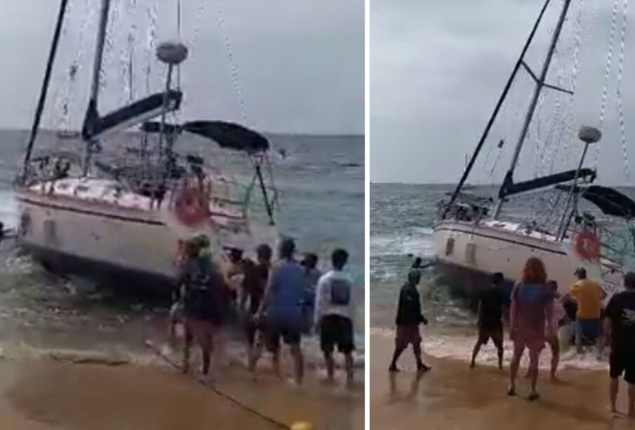 Velero varado en playa El Médano en Cabo San Lucas.