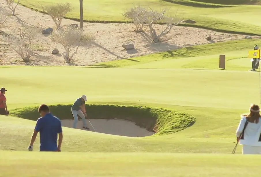 golfistas en campo