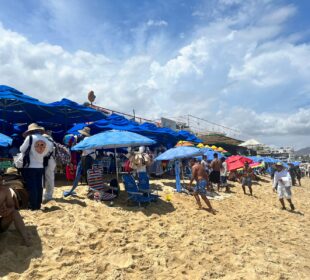 turistas en playa