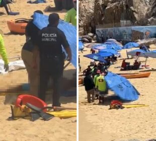 Salvavidas rescatando a turista en Playa del Amor.