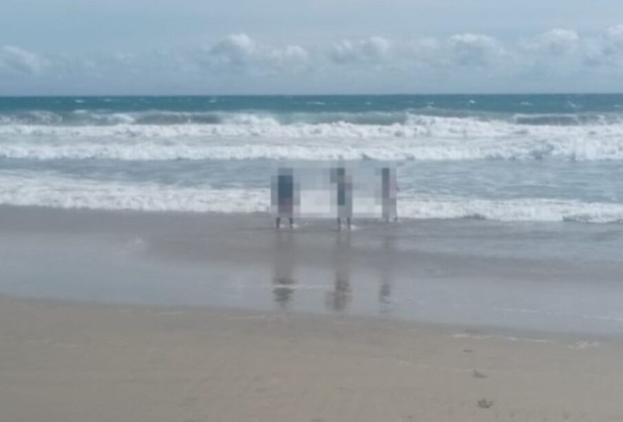 Turista salvando a joven de ahogarse en la playa San Pedrito.