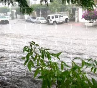 Lluvias afectan vialidades y causan emergencias