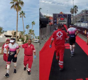 Paramédicos acompañando a atleta resagado en Ironman