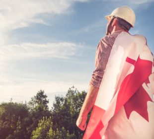 Obrero con bandera de Canadá