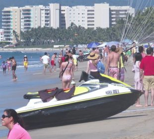 Turistas en playas de México