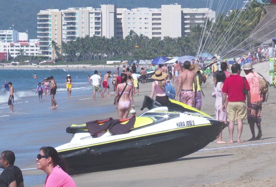 Turistas en playas de México