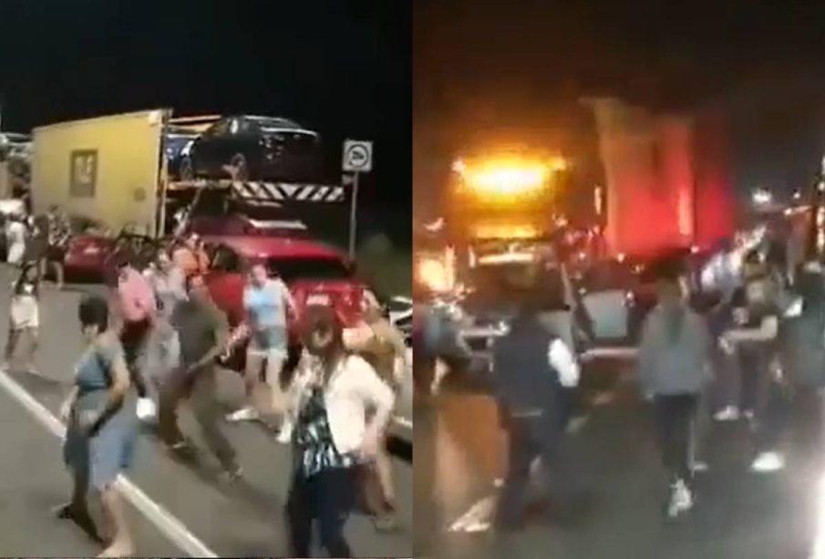 Conductores bailando en lo que esperan carretera se libere