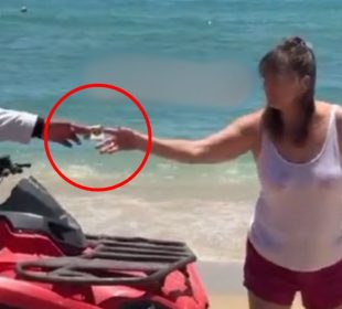(VIDEO) Extranjera ofrece "mordida" a inspector en Los Cabos tras incidente con banda sinaloense