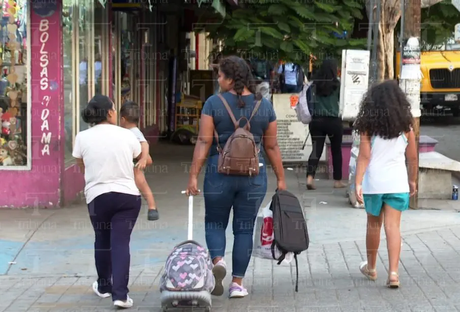 Madre con sus hijos