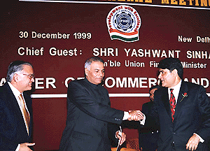 The Finance Minister Mr Yaswant Sinha, shaking hand with Mr Ashok Khanna, outoing president, PHDCCI, at the 94th Annual general meeting of PHDCCI today . 