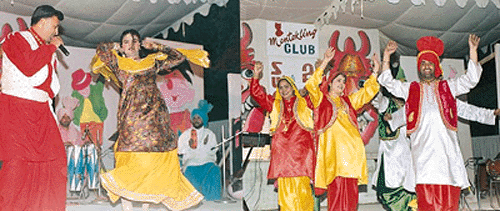 A punjab police troupe presents a cultural programme on New Year's Eve at Maharani Club, Patiala, on Friday