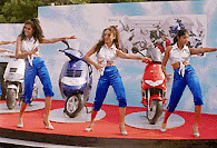 Models perform at Auto Expo in New Delhi on Wednesday.  PTI