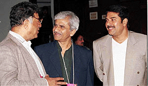 Eminent actor-director Girish Karnad has a chat with film director Jabbar Patel and famous Malayalam actor Mamooti after a Press conference at the 31st International Film Festival of India in New Delhi on Thursday