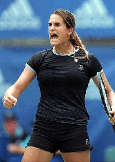 Amelie Mauresmo of France celebrates her win over Martina Hingis of Switzerland in their semi final at the Adidas International in Homebush, Sydne on Friday