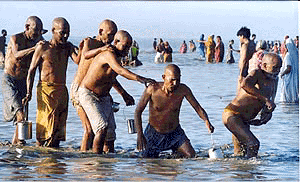 Piligrims taking a dip in the holy Ganges at the ongoing Ganga sagar mela at Sagar Island on friday